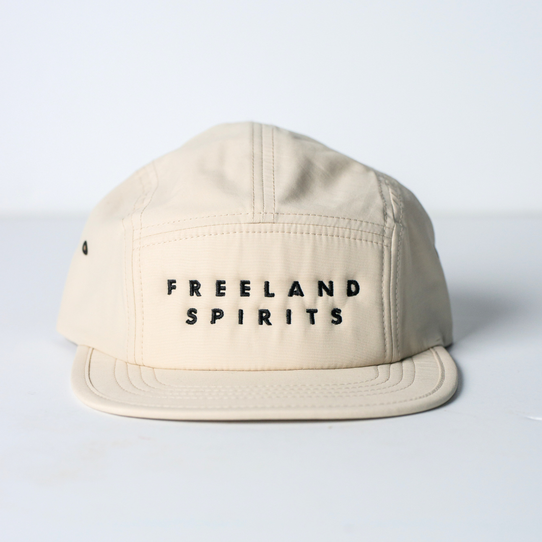 Freeland Spirits Five-Panel Hat, white hat with black embroidered Freeland Spirits logo