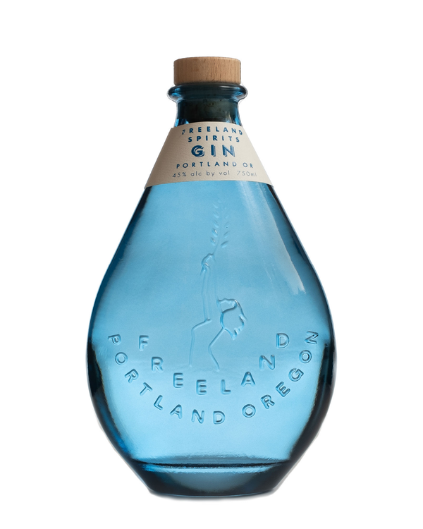 Freeland Spirits blue bottle Gin. Distilled in Portland, Oregon. 
