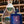 Freeland Spirits branded flask barware next to bottle of Freeland Dry Gin