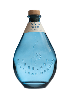 Freeland Spirits blue bottle Gin. Distilled in Portland, Oregon. 